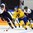HELSINKI, FINLAND - JANUARY 2: Sweden's Jakob Forsbacka Karlsson #12 stickhandles the puck with pressure from Slovakia's Ladislav Romancik #7 and Jozef Huna #15 during quarterfinal round action at the 2016 IIHF World Junior Championship. (Photo by Matt Zambonin/HHOF-IIHF Images)

